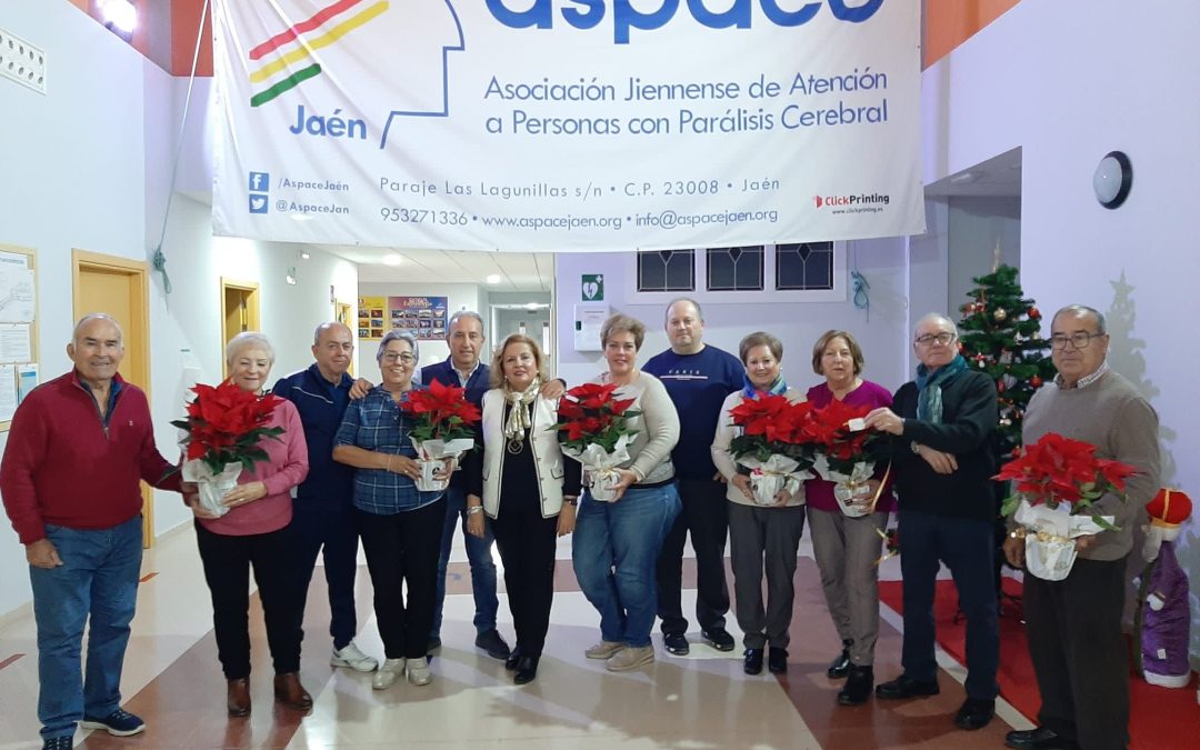 La Asociación de Baile de Mayores colabora con ASPACE en la decoración de flores de pascua